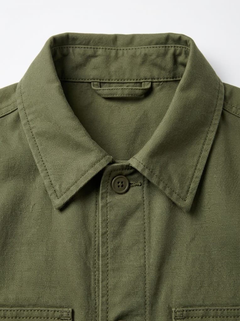 Collar close-up of olive canvas utility shacket